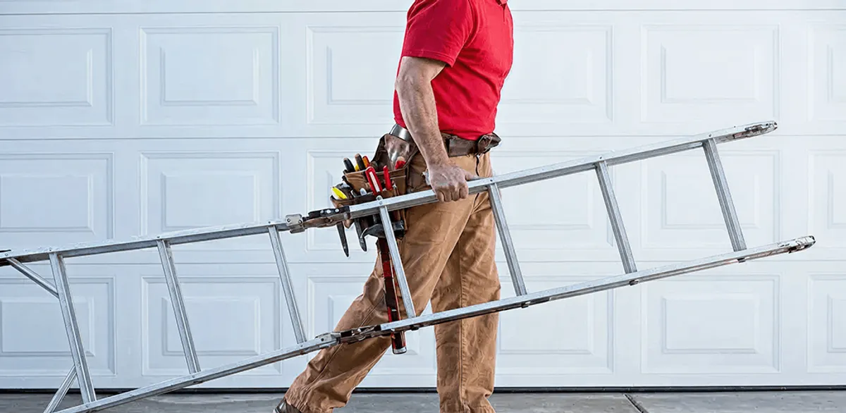 Garage door repair technician arriving with tools and ladder in Las Vegas, NV